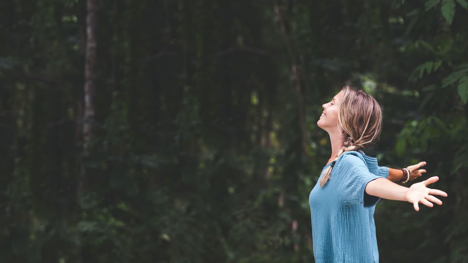 woman happy and healthy in nature