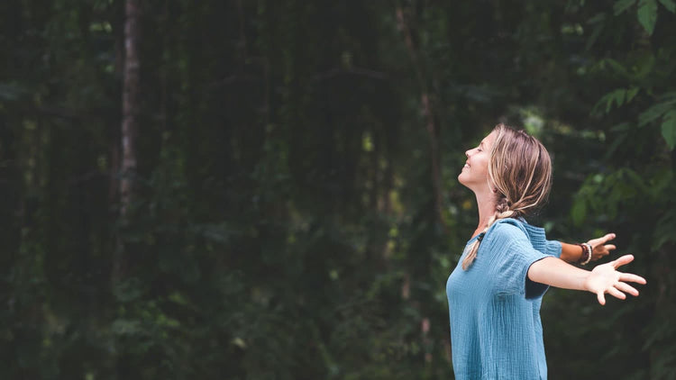 woman happy and healthy in nature